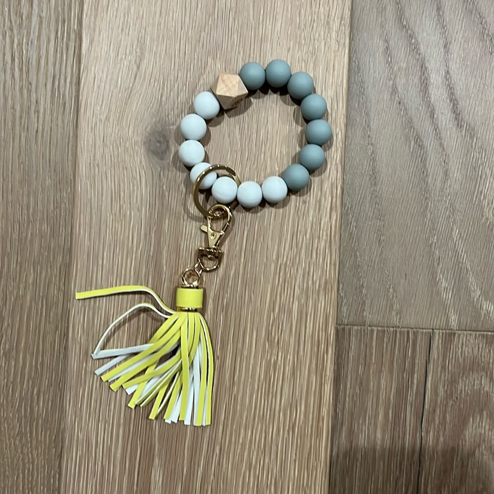Wrist keychains with essential oils diffuser